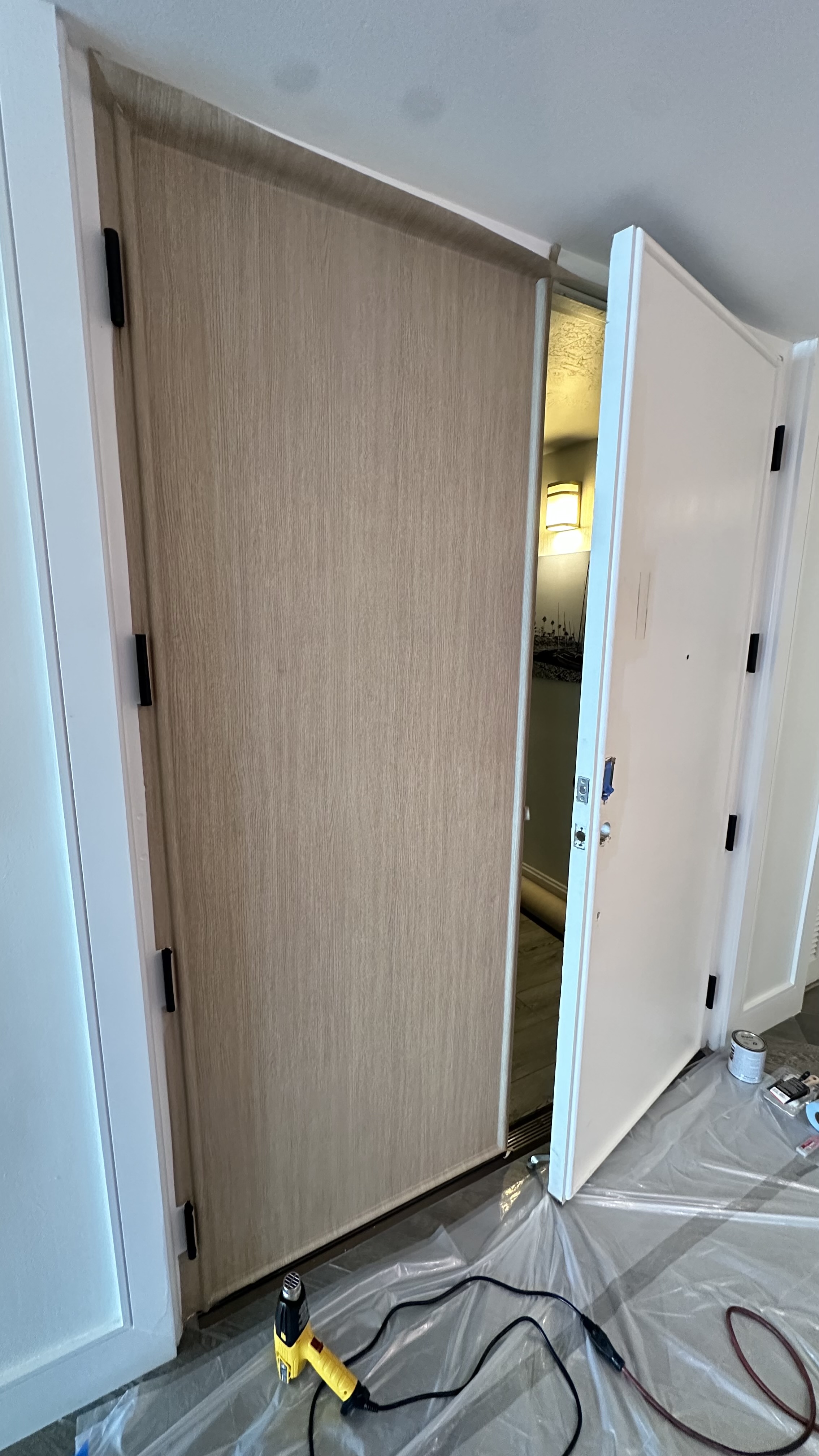 Door panel partway through wrap installation